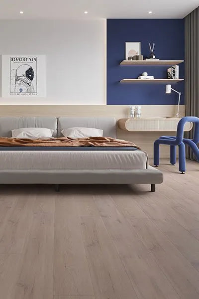 Ivory Beige Elegant SPC Hybrid 6.5mm Flooring 5+1.5mm installed in a modern bedroom featuring a low-profile grey bed, blue accent wall, and floating timber shelves.
