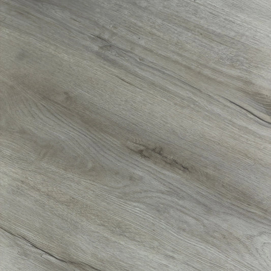 Close-up texture shot of Kandos Grey Urban Laminate 12mm Flooring 12mm showing realistic grey wood grain with subtle knot detail and fine linear surface texture.