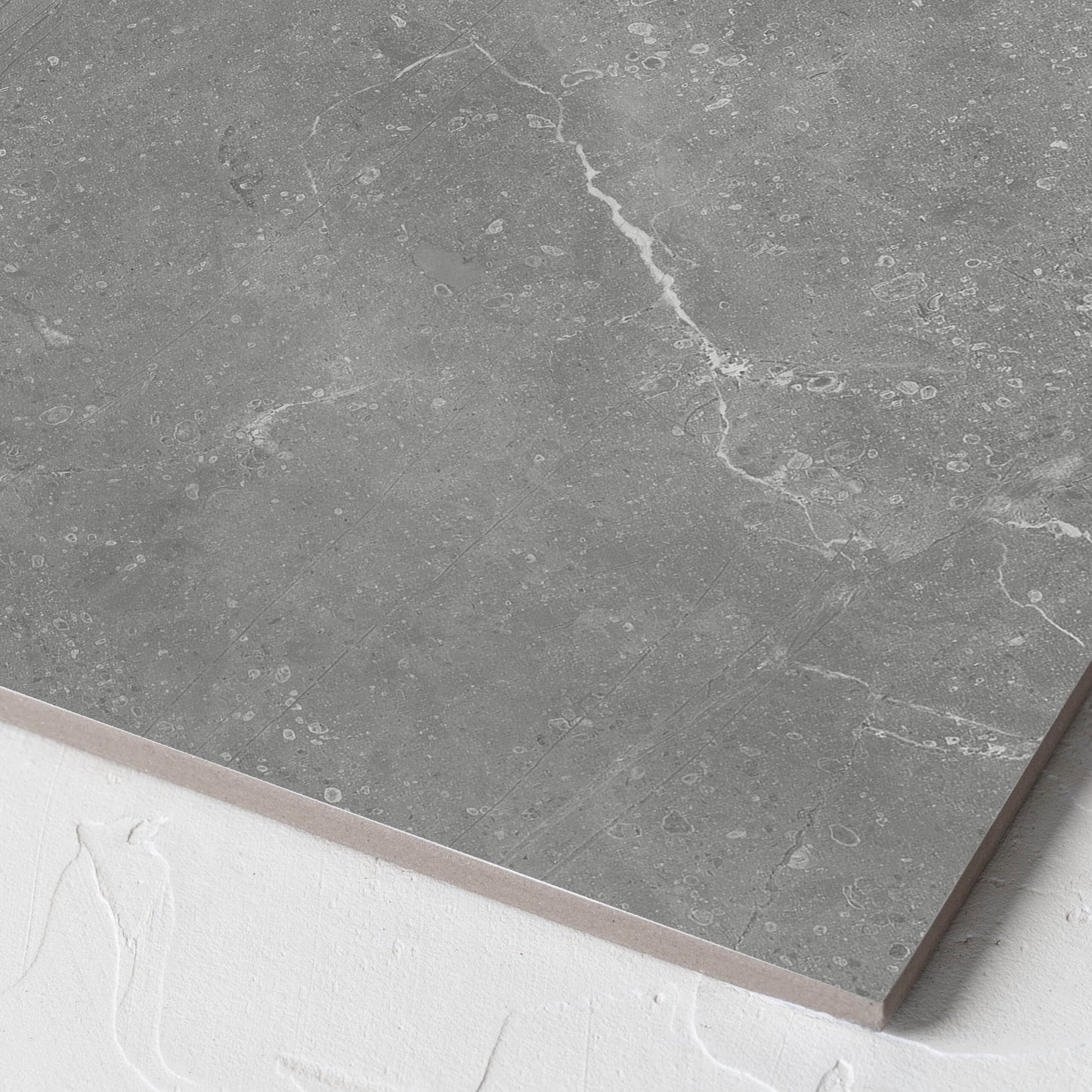 Corner close-up of the Kashmir Ash Matt 300x300mm tile showing the matt surface and the edge profile
