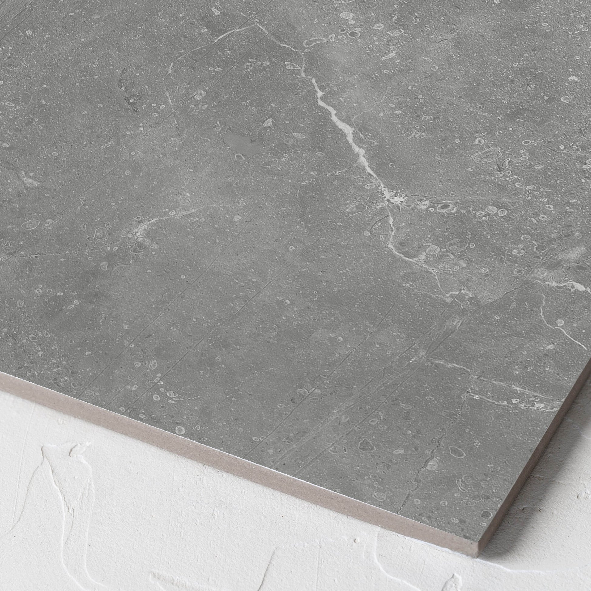 Corner close-up of the Kashmir Ash Matt 300x300mm tile showing the matt surface and the edge profile
