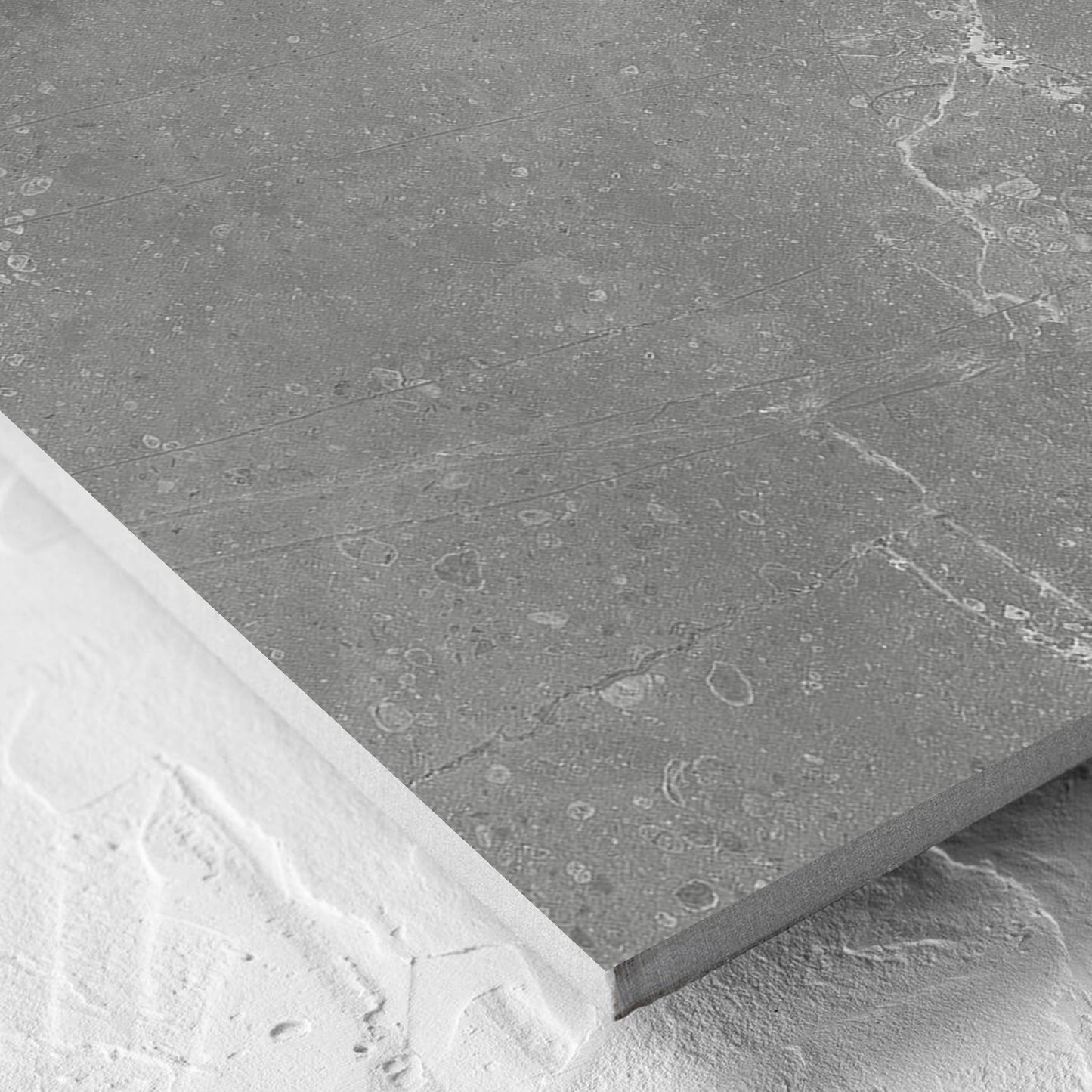 Corner close-up of the Kashmir Ash Matt 600x600mm tile showing the matt surface and the edge profile
