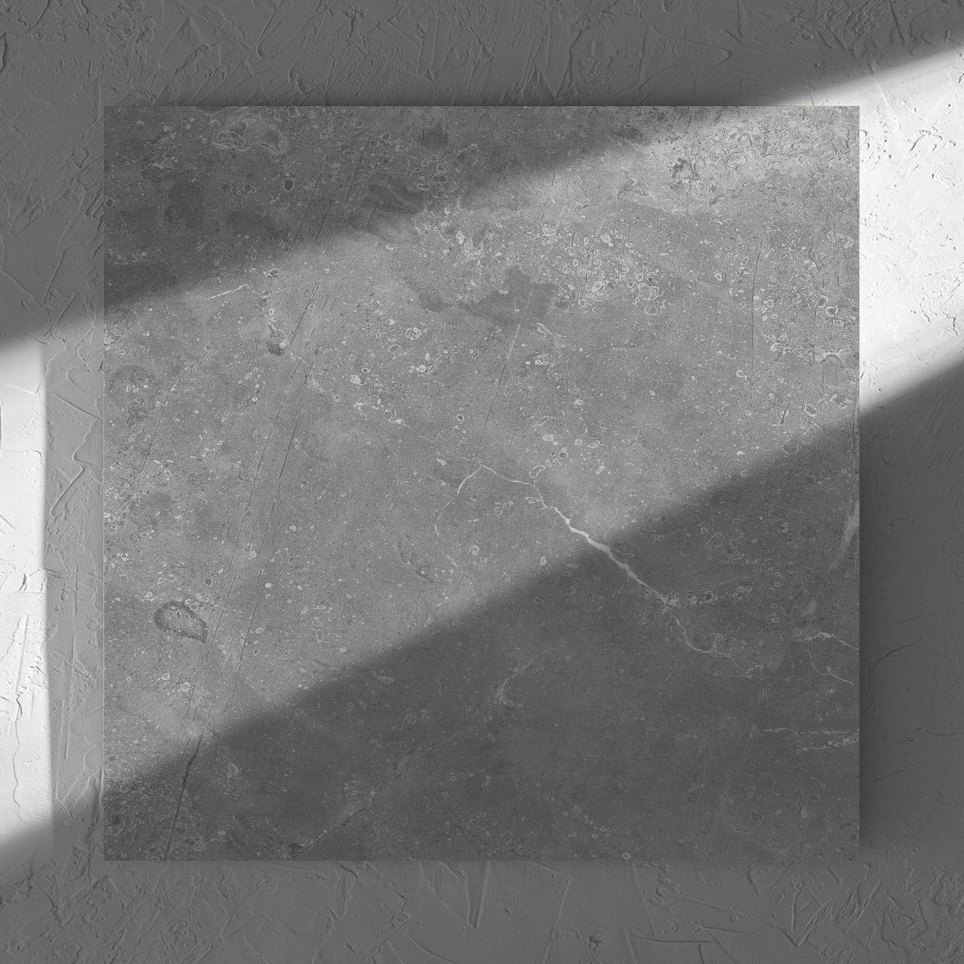Kashmir Ash Matt 600x600mm tile in soft natural window light, showing the matt surface