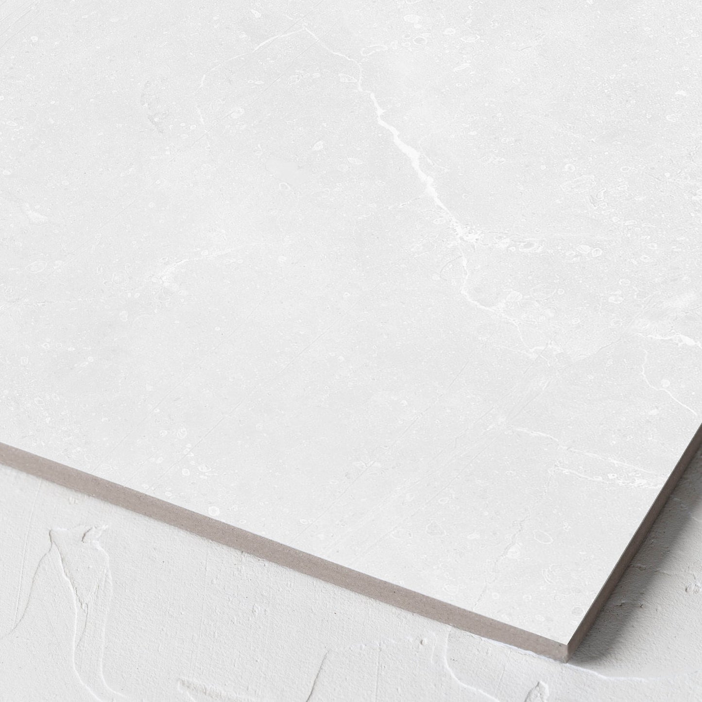 Corner close-up of the Kashmir Bone Matt 300x300mm tile showing the matt surface and the edge profile