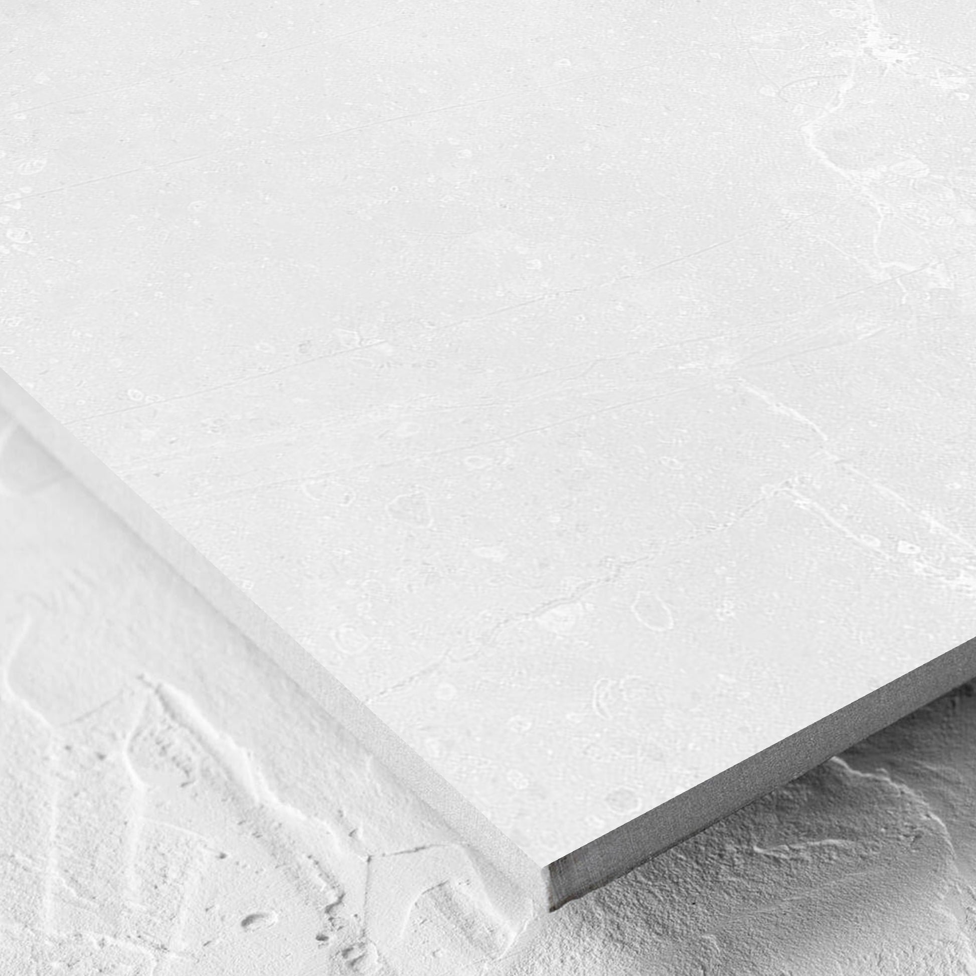 Corner close-up of the Kashmir Bone Matt 600x600mm tile showing the matt surface and the edge profile