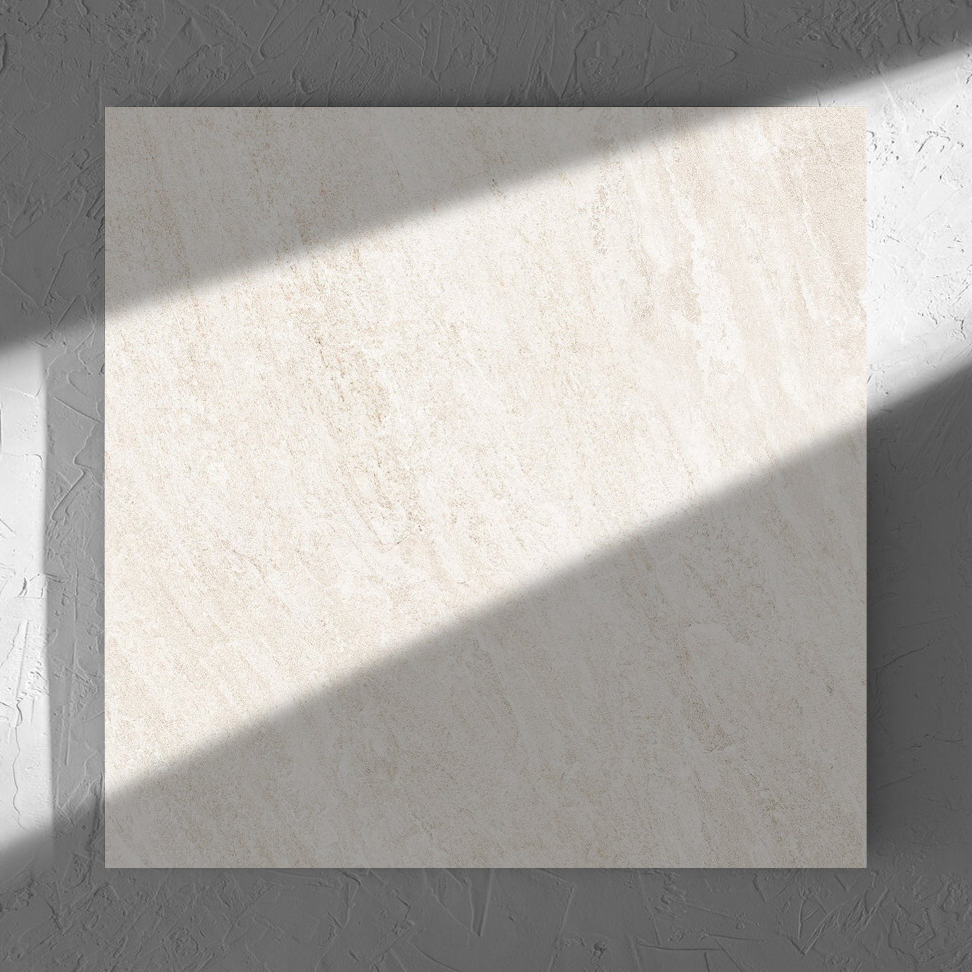 Kora Stone Chalk Matt 600x600mm tile in soft natural window light, showing the matt surface
