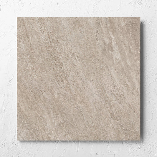 Kora Stone Clay Matt 600x600mm tile laid flat on a white rendered wall, showing the matt surface