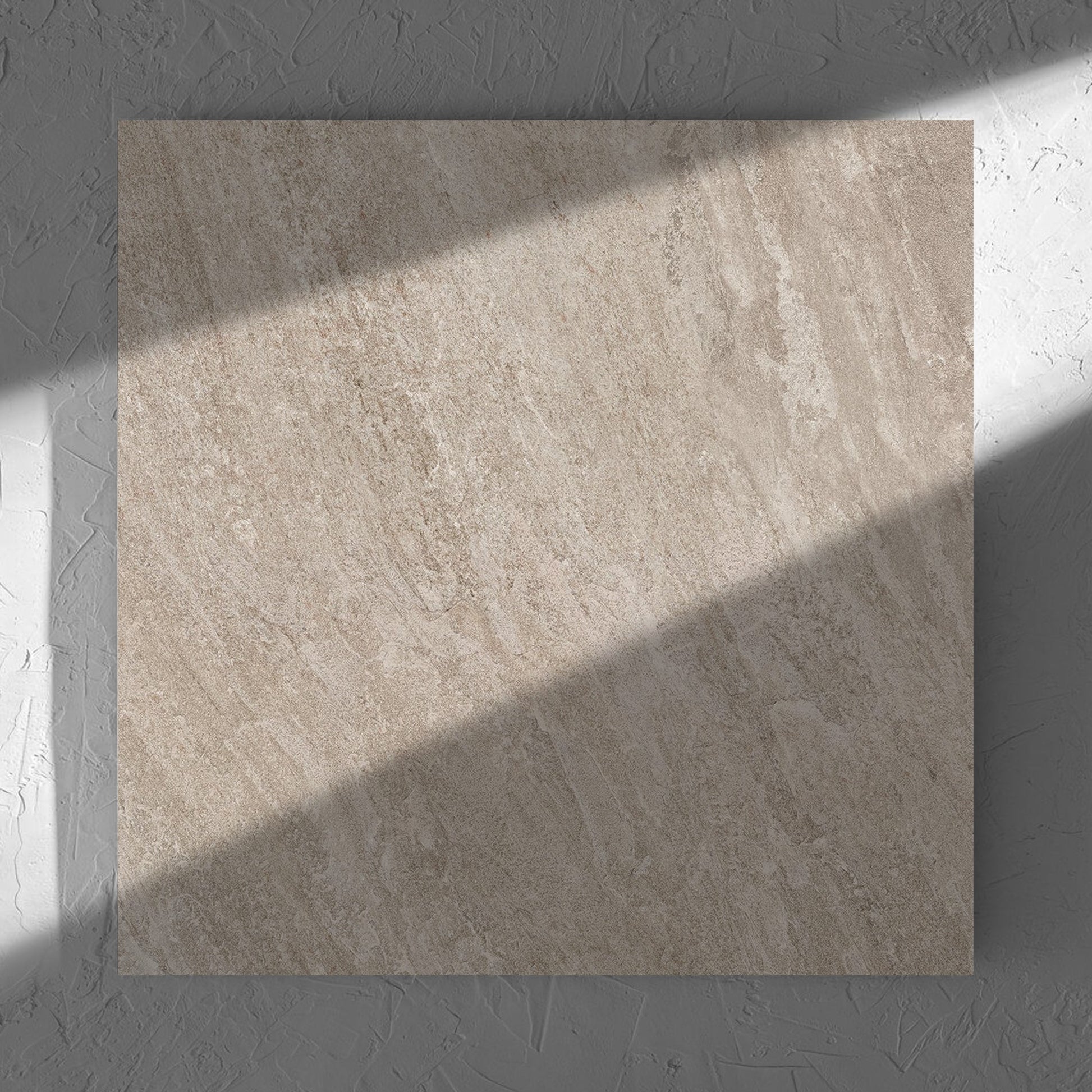 Kora Stone Clay Matt 600x600mm tile in soft natural window light, showing the matt surface
