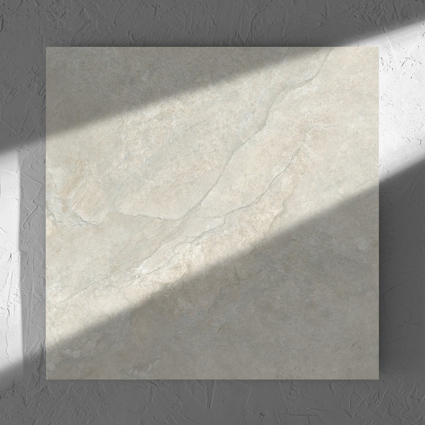 Lakestone Grey Matt 600x600mm tile in soft natural window light, showing the matt surface