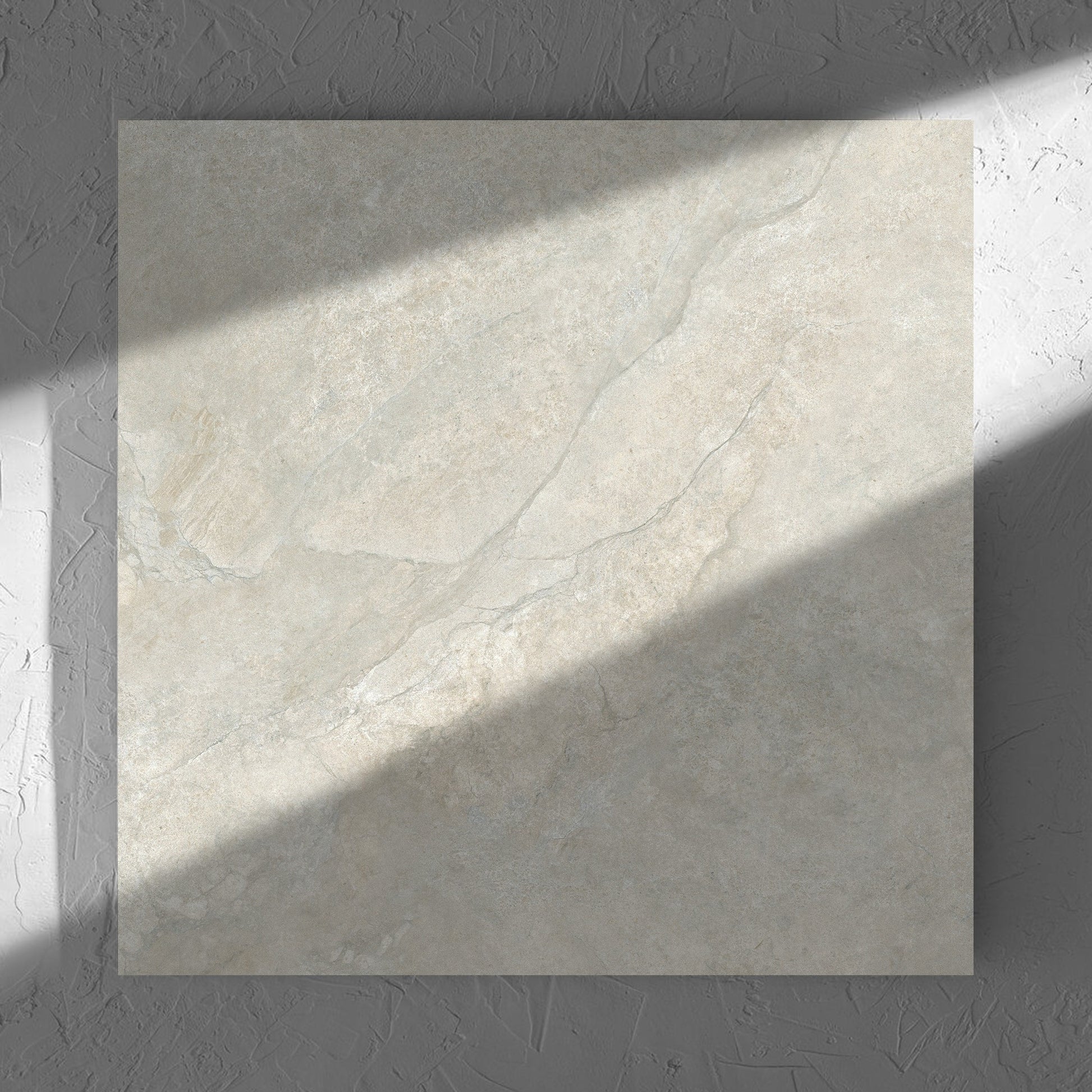 Lakestone Grey Matt 600x600mm tile in soft natural window light, showing the matt surface