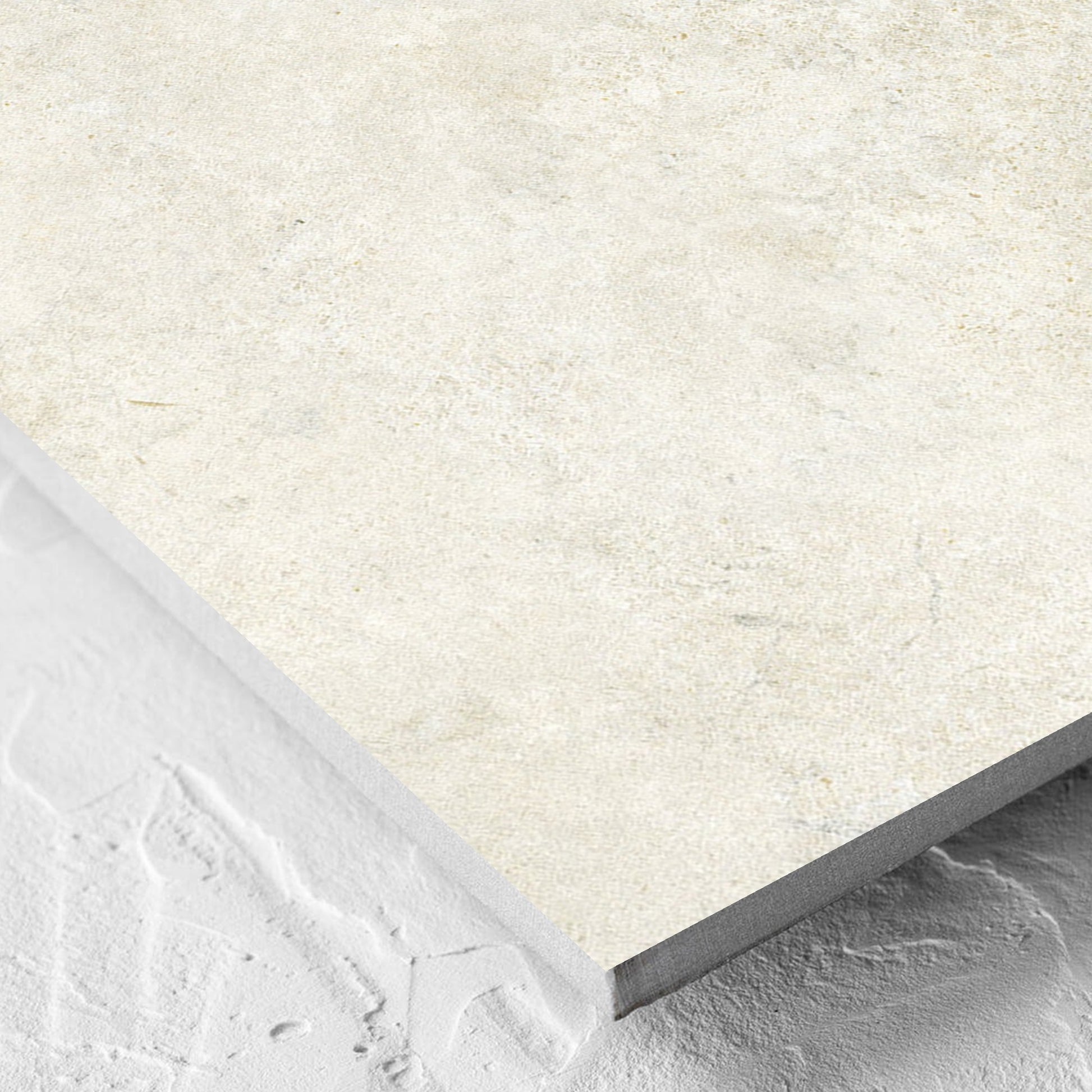 Corner close-up of the Lakestone Sand Matt 600x600mm tile showing the matt surface and the edge profile