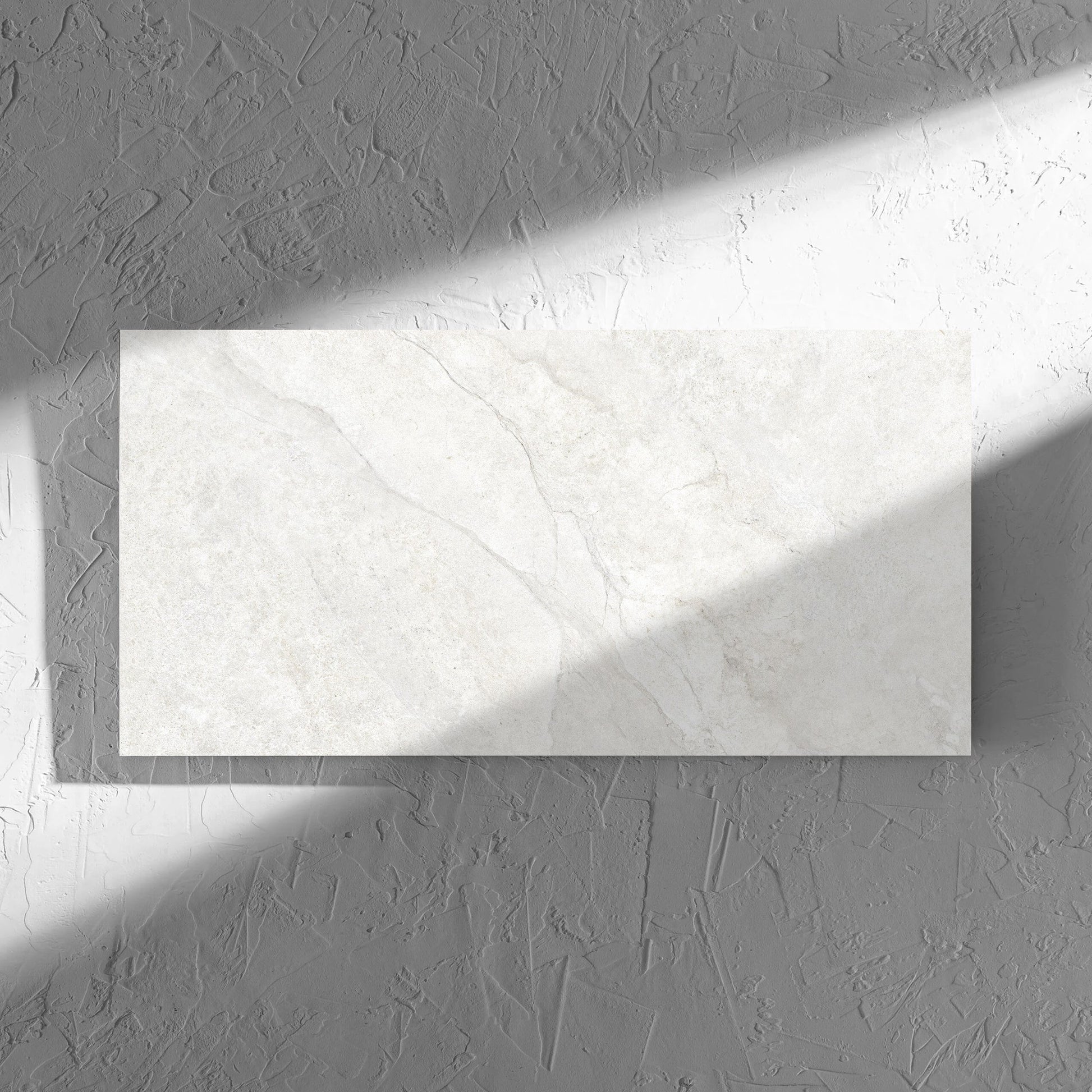 Lakestone White Matt 300x600mm tile in soft natural window light, showing the matt surface