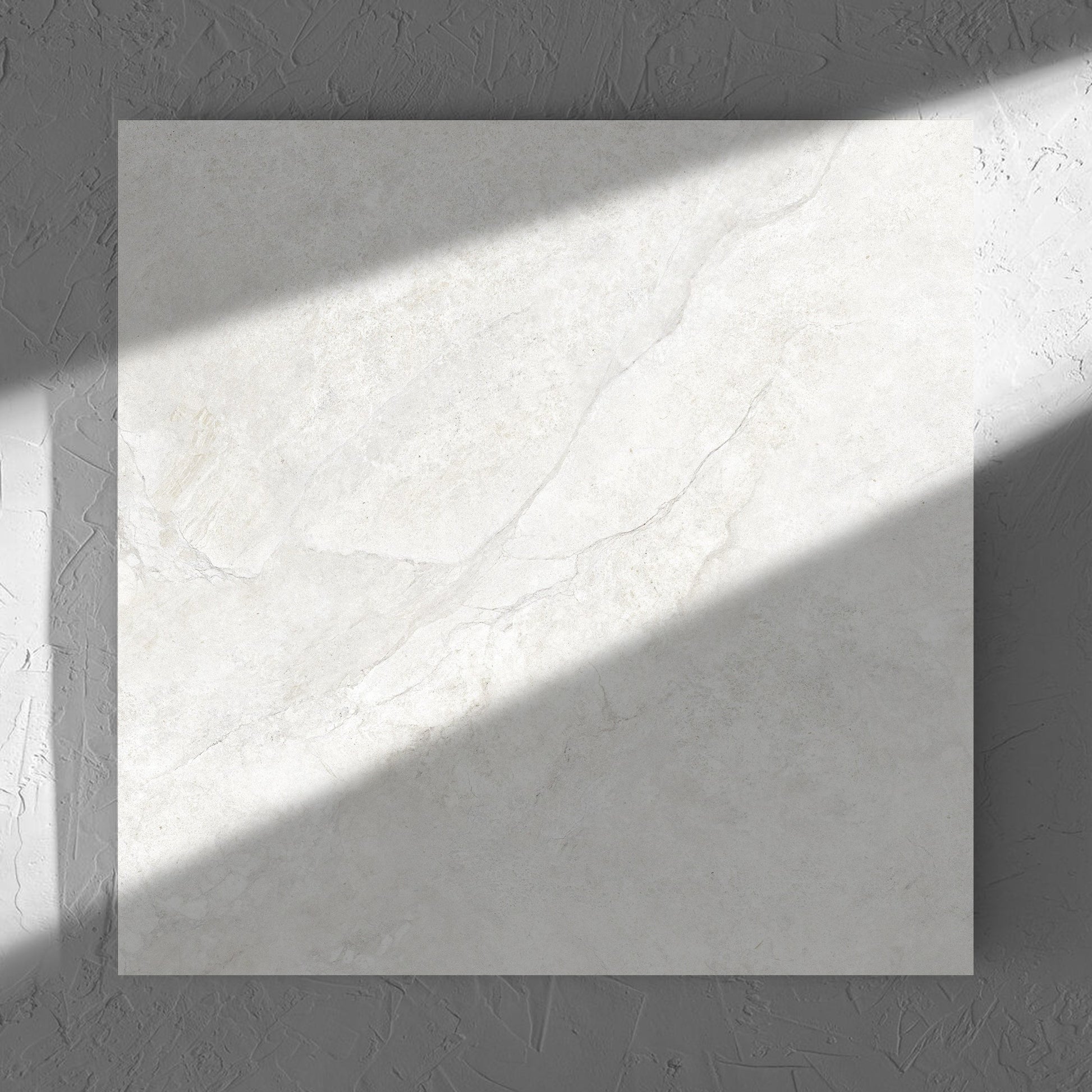 Lakestone White Matt 600x600mm tile in soft natural window light, showing the matt surface