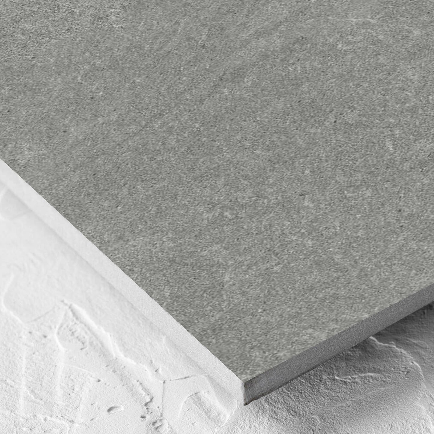 Corner close-up of the Lava Grey Amber 300x600mm tile showing the lappato surface and the edge profile