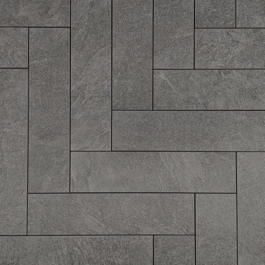 Lava Grey Amber Brick/Subway 75x300mm tiles shown in a mixed-format stacked pattern with dark grey stone texture and subtle veining.