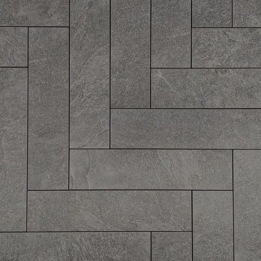 Lava Grey Amber Brick/Subway 75x300mm tiles shown in a mixed-format stacked pattern with dark grey stone texture and subtle veining.