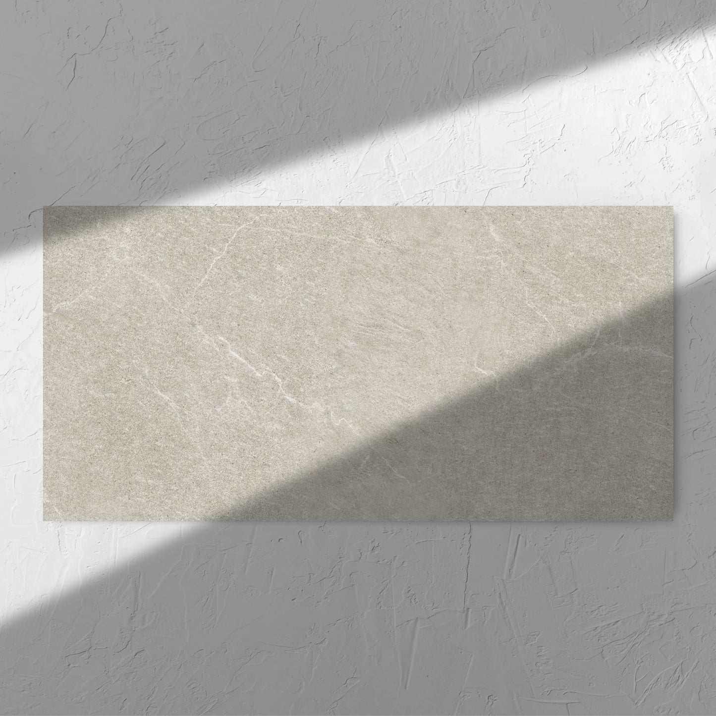 Lava Soft Beige Amber 600x1200mm tile in soft natural window light, showing the tile surface