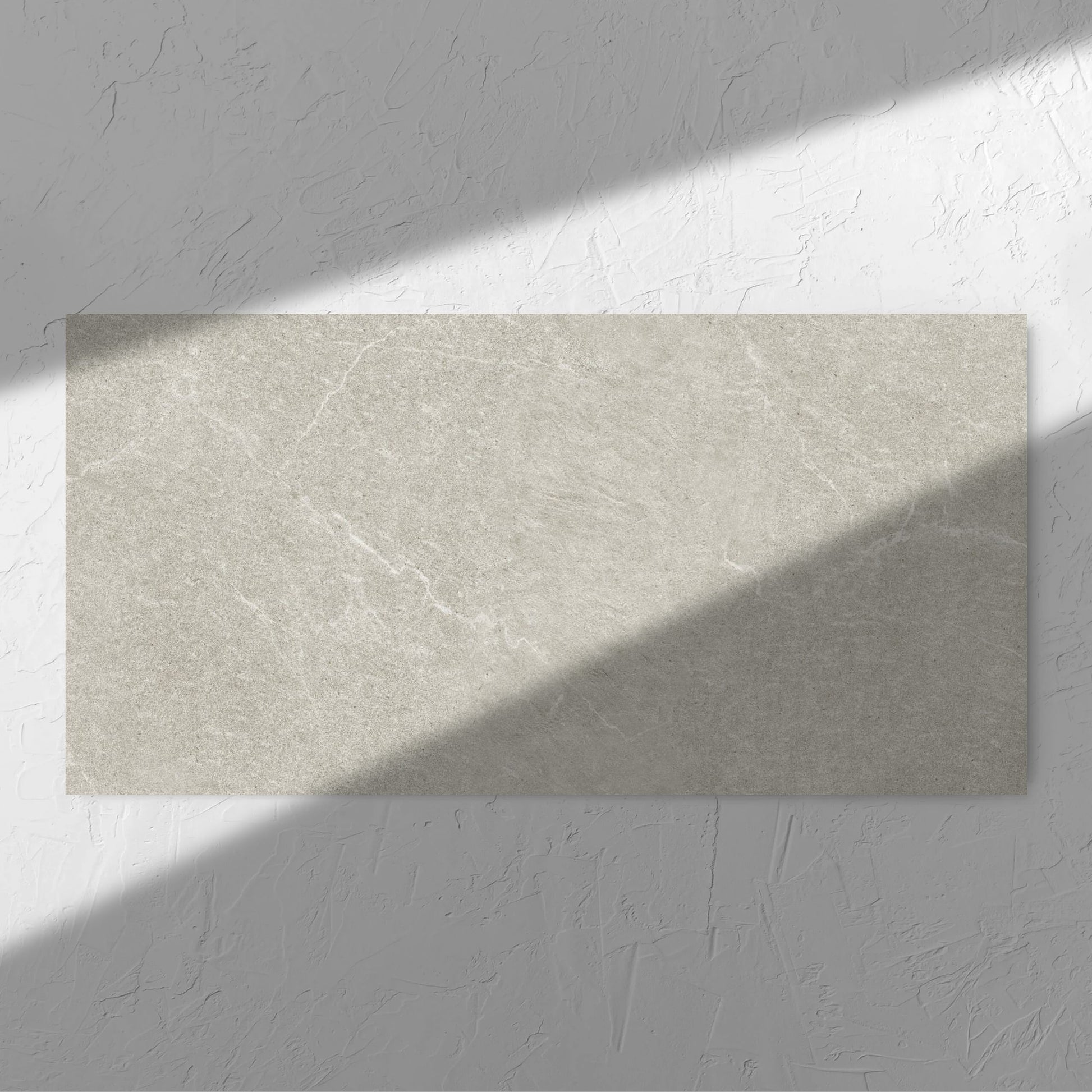 Lava Soft Beige Amber 600x1200mm tile in soft natural window light, showing the tile surface