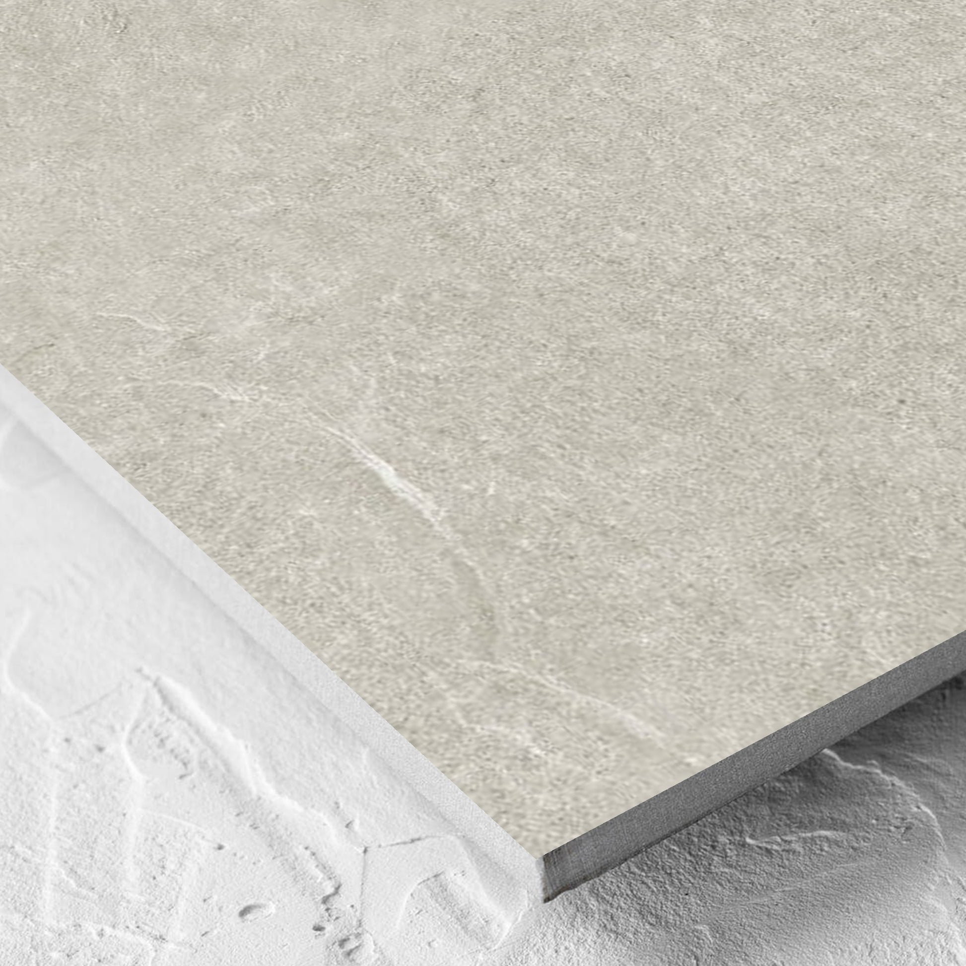 Corner close-up of the Lava Soft Beige Amber 600x600mm tile showing the soft beige lappato surface and the edge profile