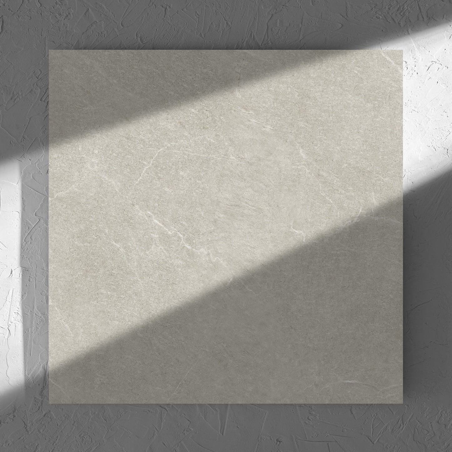 Lava Soft Beige Amber 600x600mm tile in soft natural window light, showing the soft beige lappato surface
