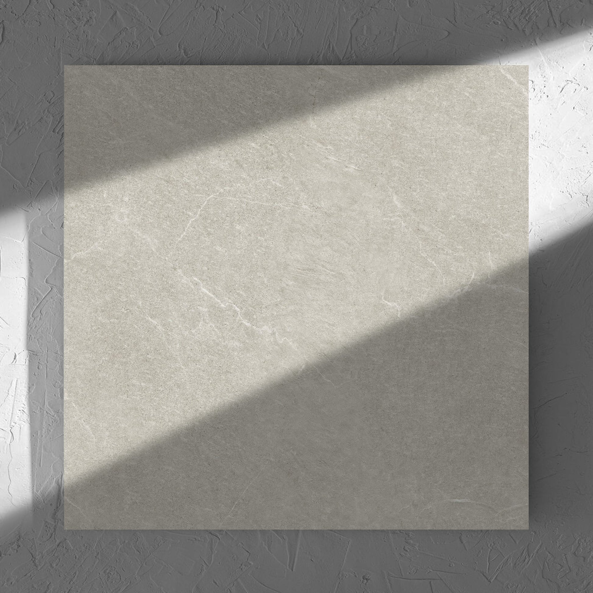 Lava Soft Beige Amber 600x600mm tile in soft natural window light, showing the soft beige lappato surface