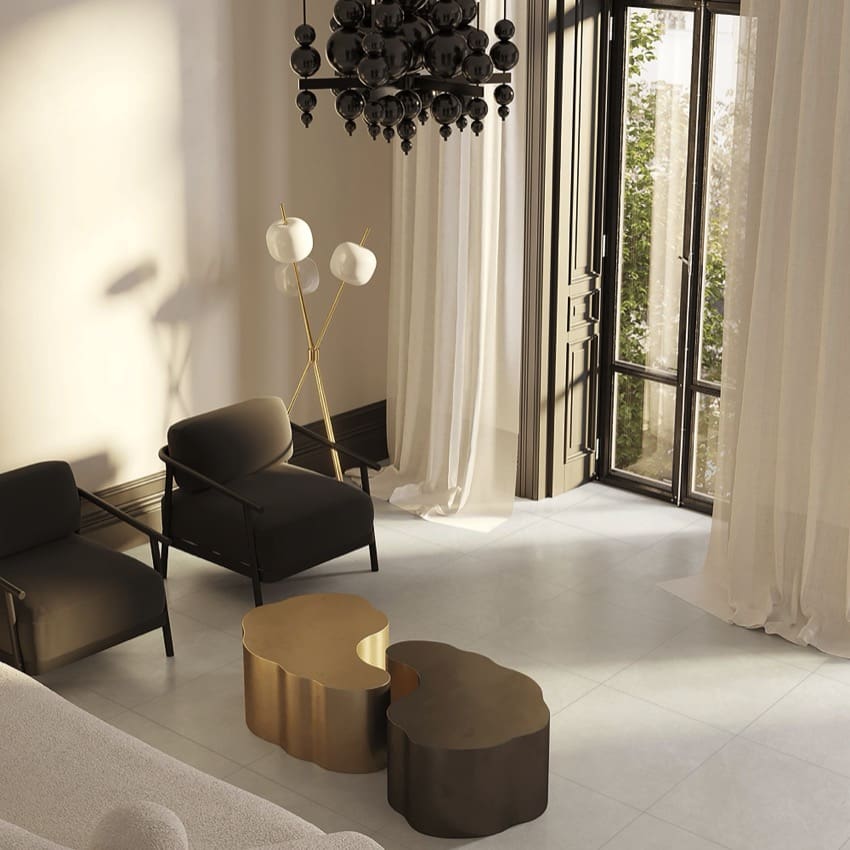 Lava White Amber 300x600mm large-format floor tiles in a luxury living room styled with organic brass coffee tables and a sculptural black chandelier.