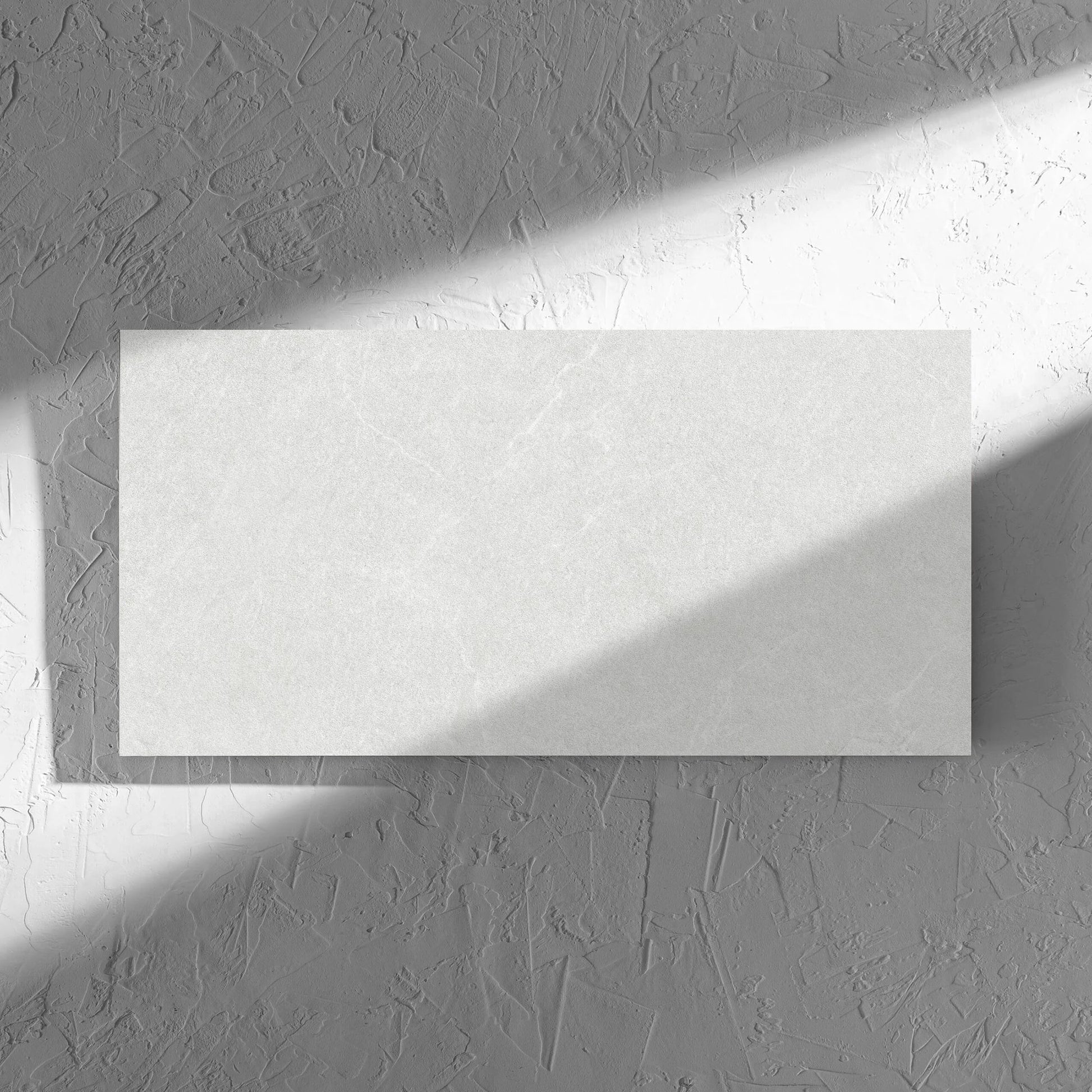 Lava White Amber 300x600mm tile in soft natural window light, showing the tile surface