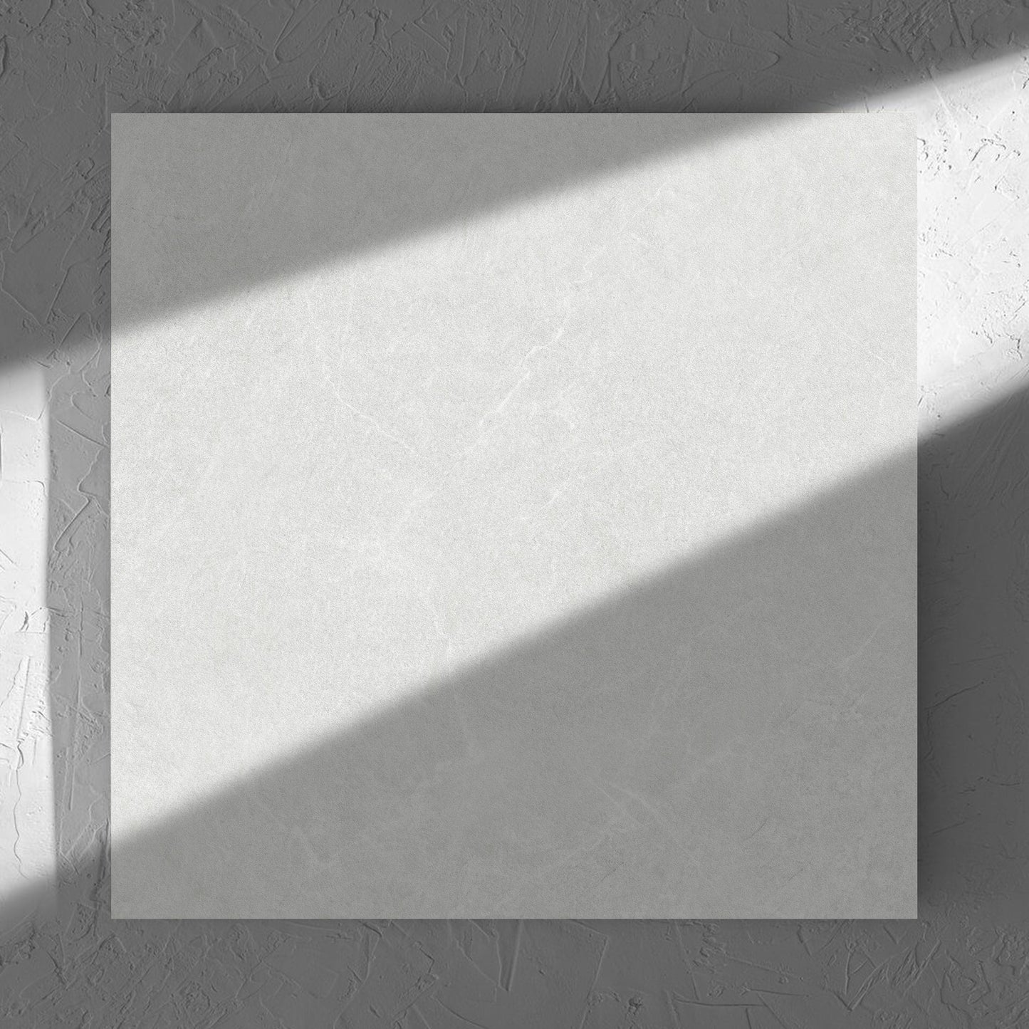 Lava White Inout 600x600mm tile in soft natural window light, showing the white lappato surface
