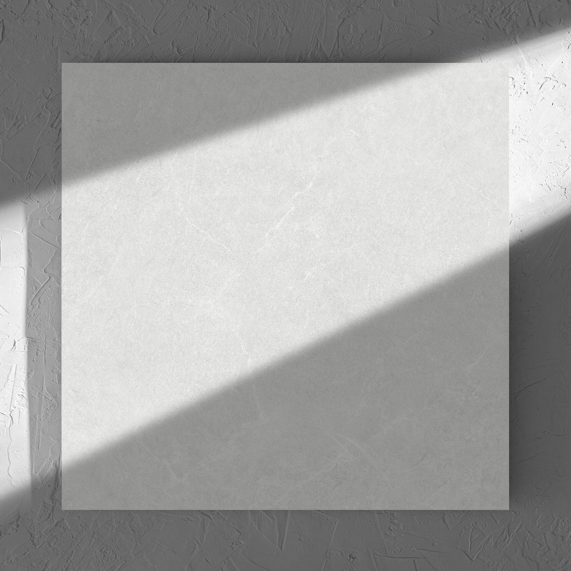 Lava White Inout 600x600mm tile in soft natural window light, showing the white lappato surface