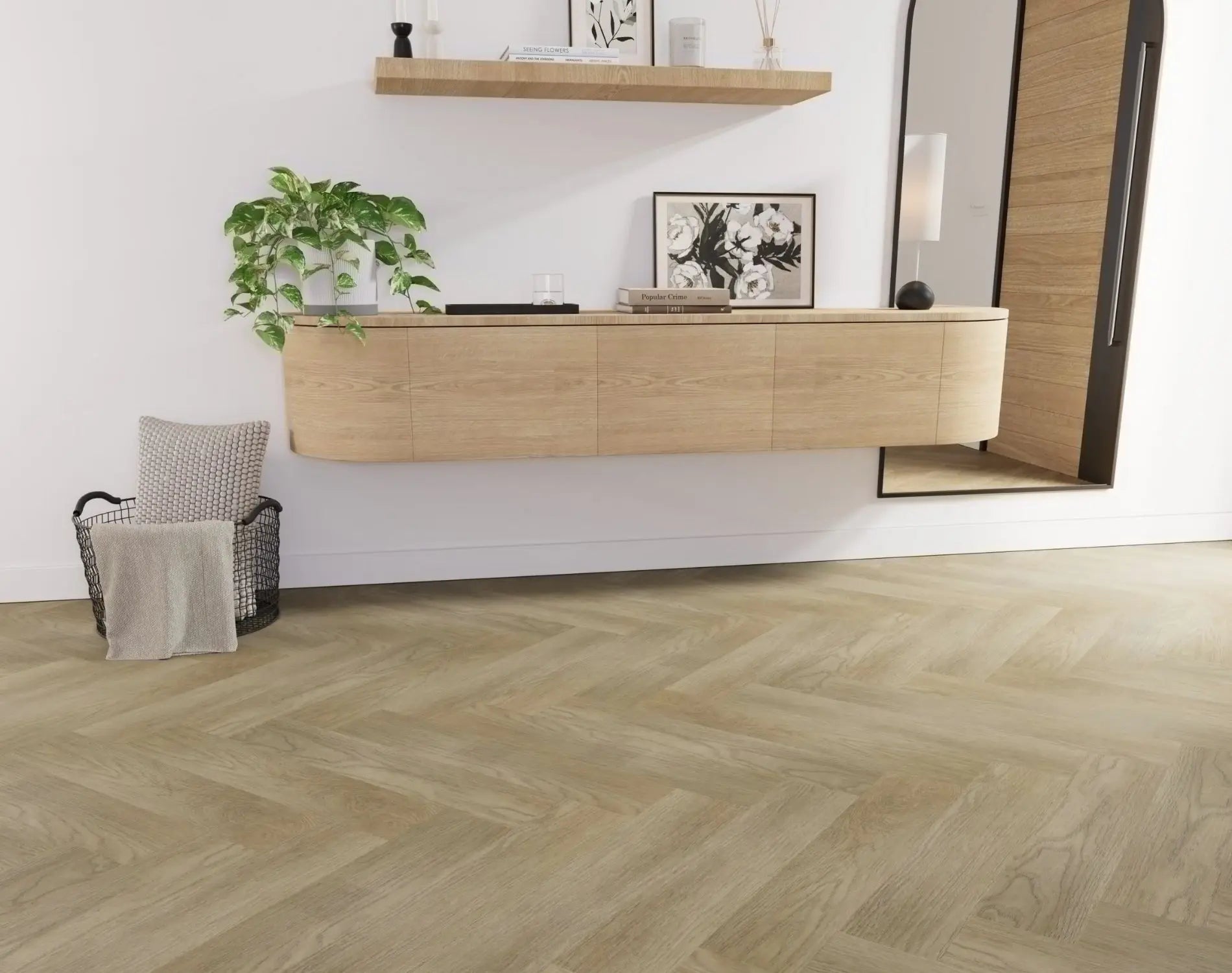 Lime Ash Elegant SPC Hybrid Herringbone 9.5mm Flooring 7.5+2mm installed in a modern living room featuring a floating oak sideboard and trailing green plant.