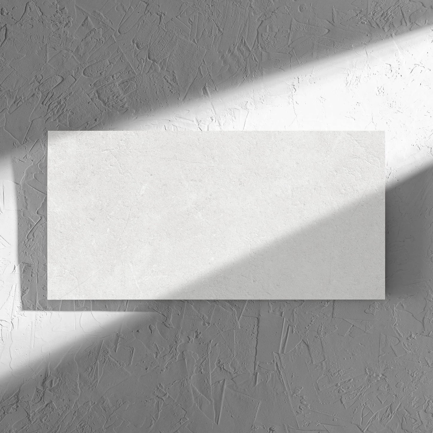 Lusso Bianco Amber 300x600mm tile in soft natural window light, showing the matt surface