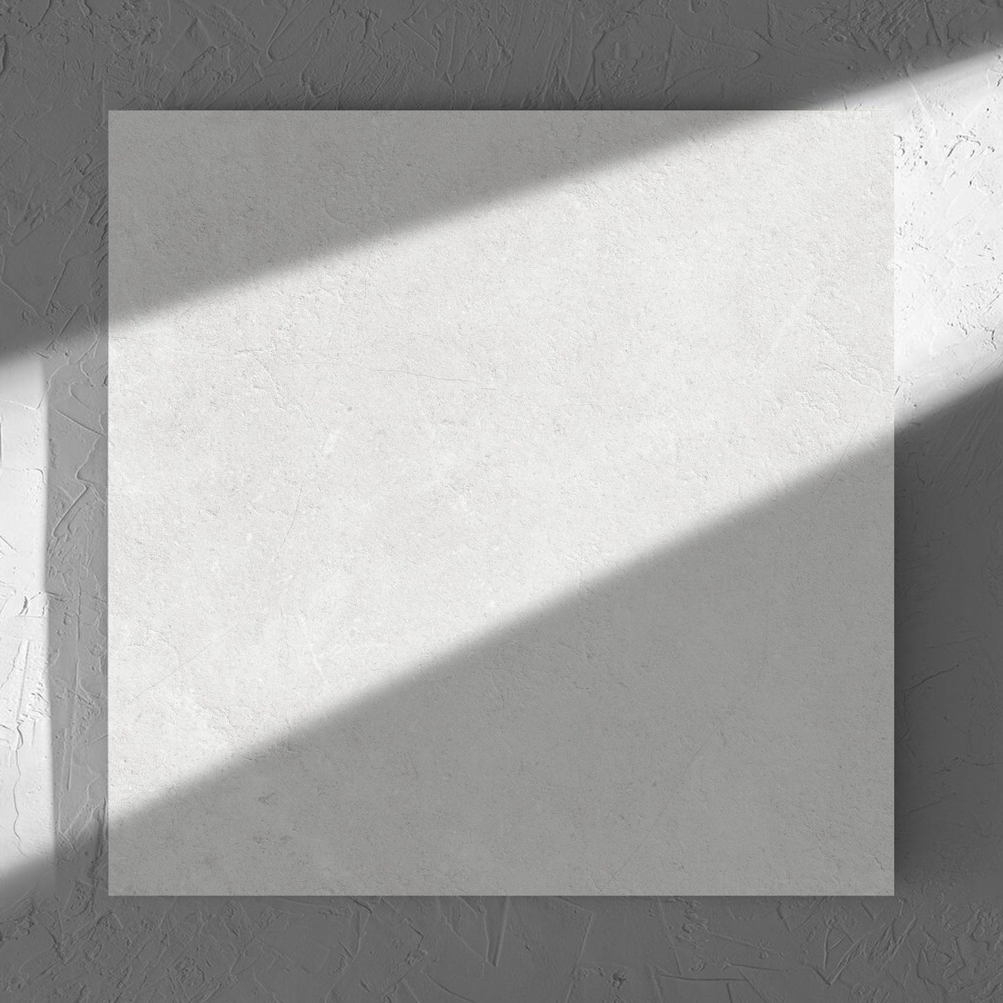 Lusso Bianco Amber 600x600mm tile in soft natural window light, showing the matt surface