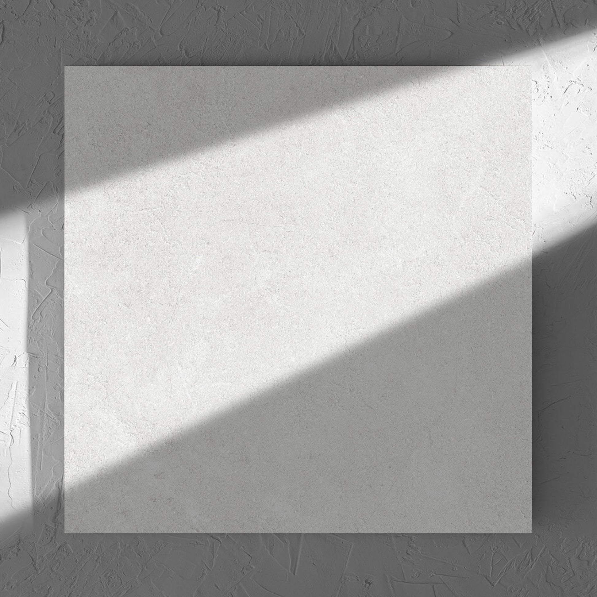 Lusso Bianco Matt 600x600mm tile in soft natural window light, showing the matt surface