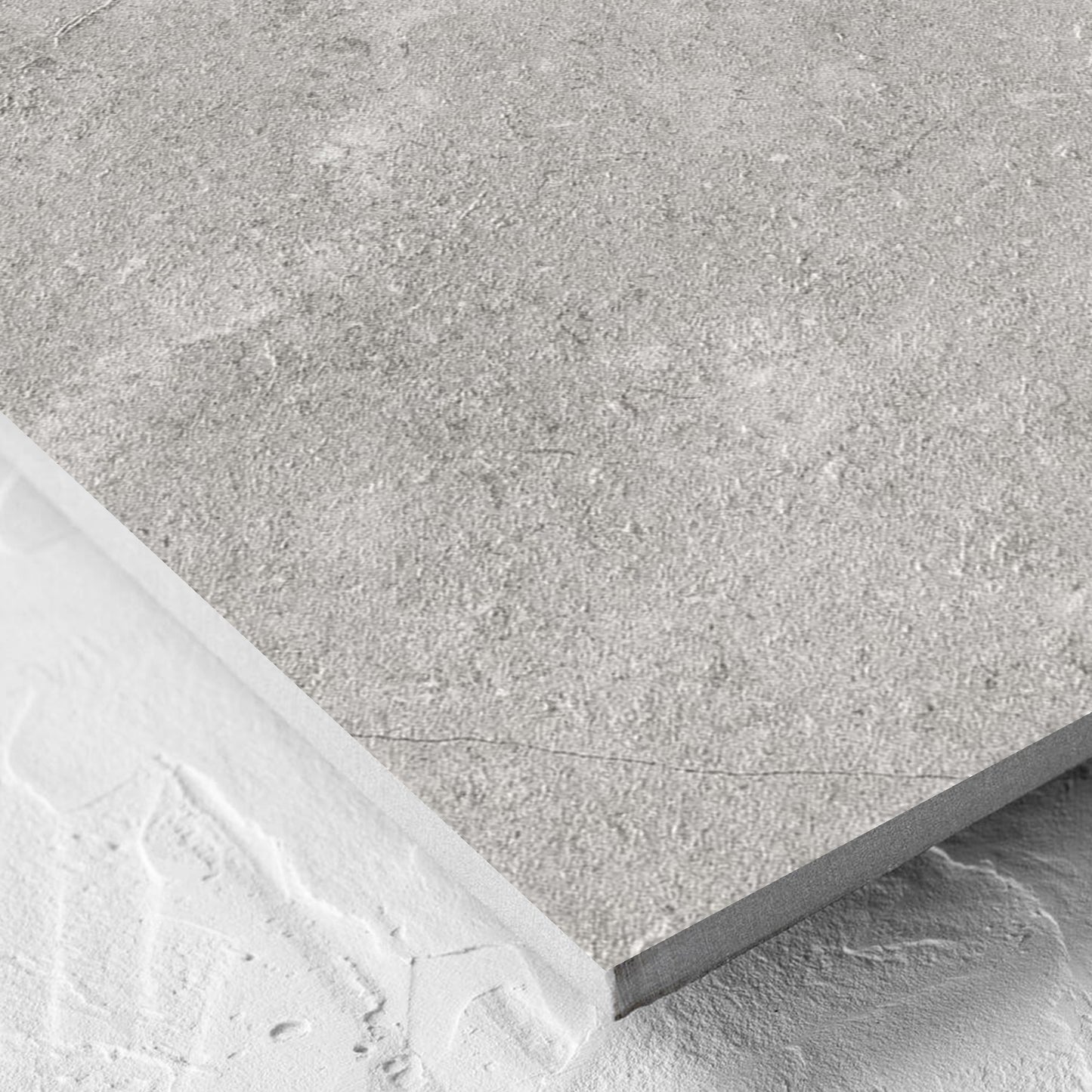 Corner close-up of the Lusso Grigio Matt 600x600mm tile showing the matt surface and the edge profile
