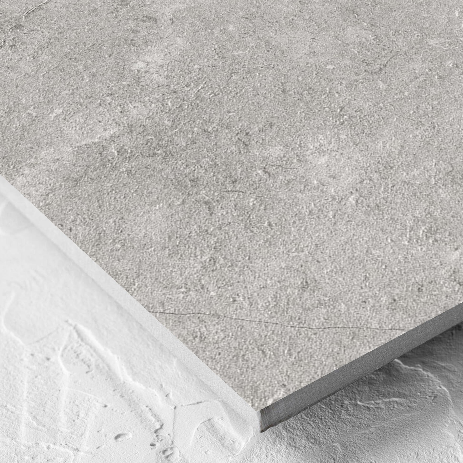 Corner close-up of the Lusso Grigio Matt 600x600mm tile showing the matt surface and the edge profile