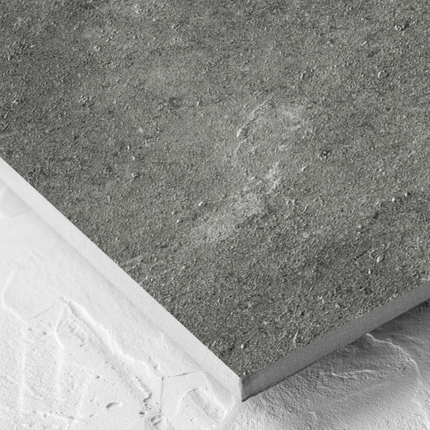Corner close-up of the Lusso Midnight Amber 300x600mm tile showing the matt surface and the edge profile