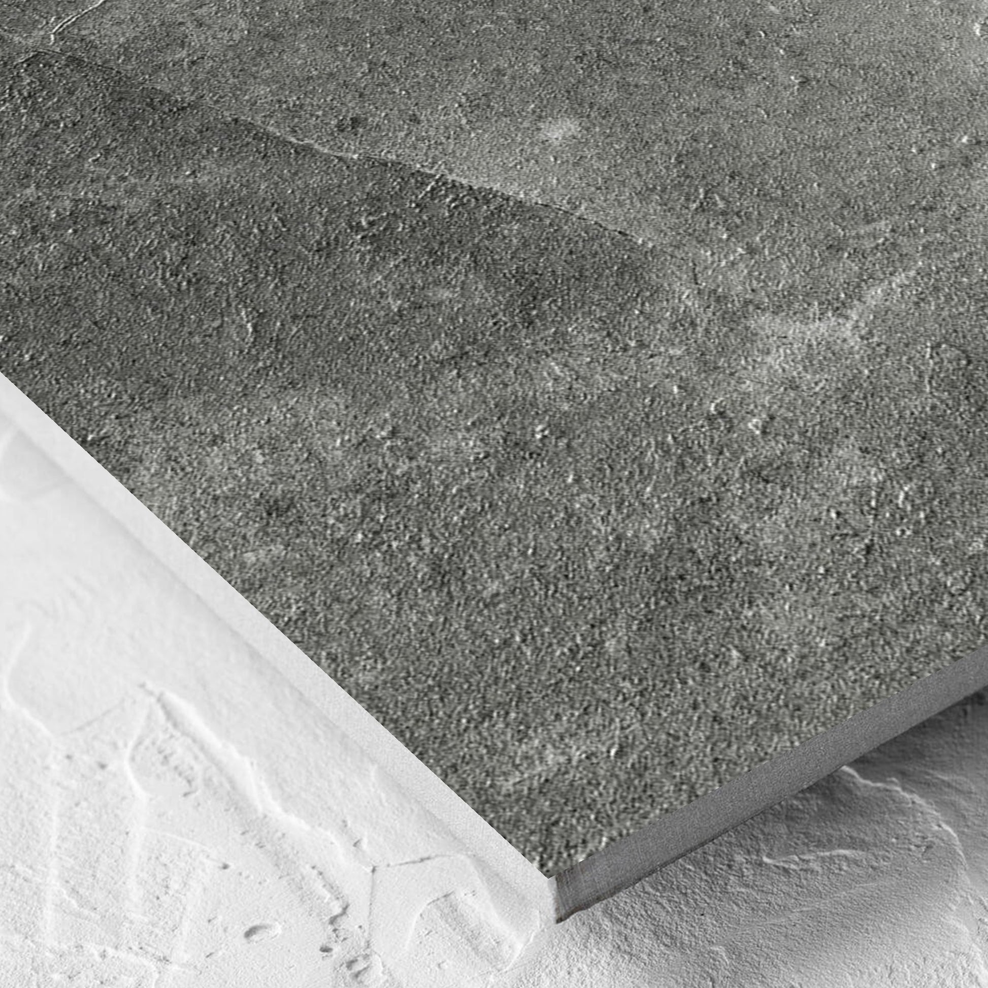 Corner close-up of the Lusso Midnight Matt 600x600mm tile showing the matt surface and the edge profile