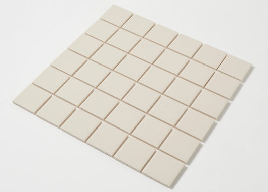 Marlowe Bone Matt Mosaic 48x48mm shown as a flat lay grid of uniform cream-toned square tiles with a smooth matte finish.