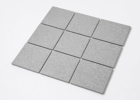 Pack shot of Marlowe Cement Speckled Matt Mosaic 97x97mm tiles arranged in a 3x3 grid showing their grey speckled matt finish and square shape.