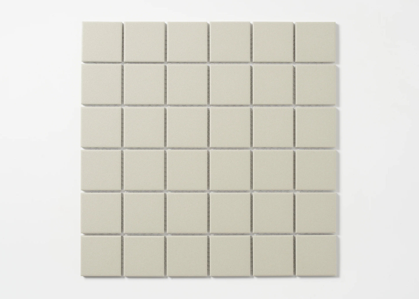 Pack shot of Marlowe Light Grey Matt Mosaic 48x48mm tiles arranged in a uniform 6x6 grid, showing a soft matte finish and consistent light grey colour.