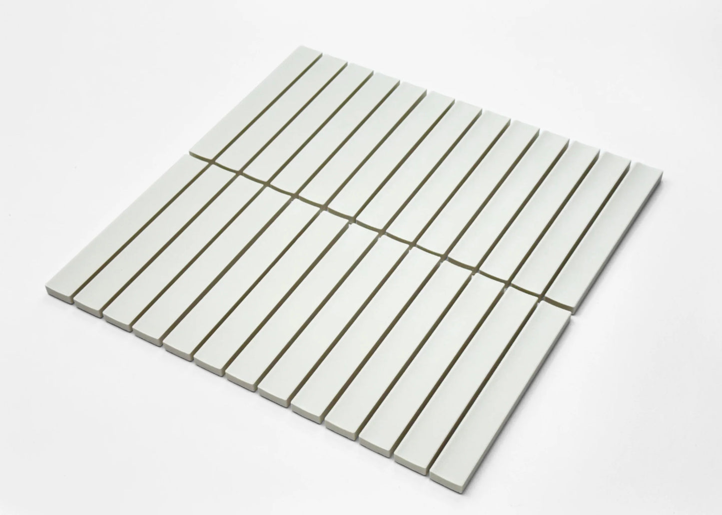 Pack shot of Marlowe Porcelain White Concave Speckled Matt Rectangle 20x145mm tiles arranged in a flat lay grid showing their slim rectangular shape and soft white matt finish.