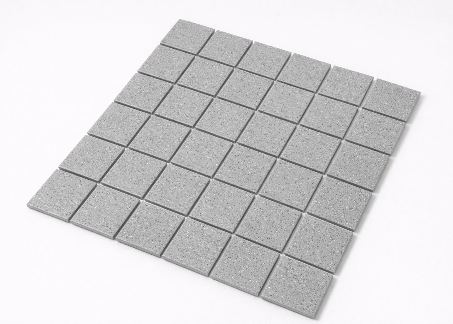Pack shot of Marlowe Smoke Speckled Matt Mosaic 48x48mm tiles arranged in a square grid, showing grey speckled matt finish and uniform square format.