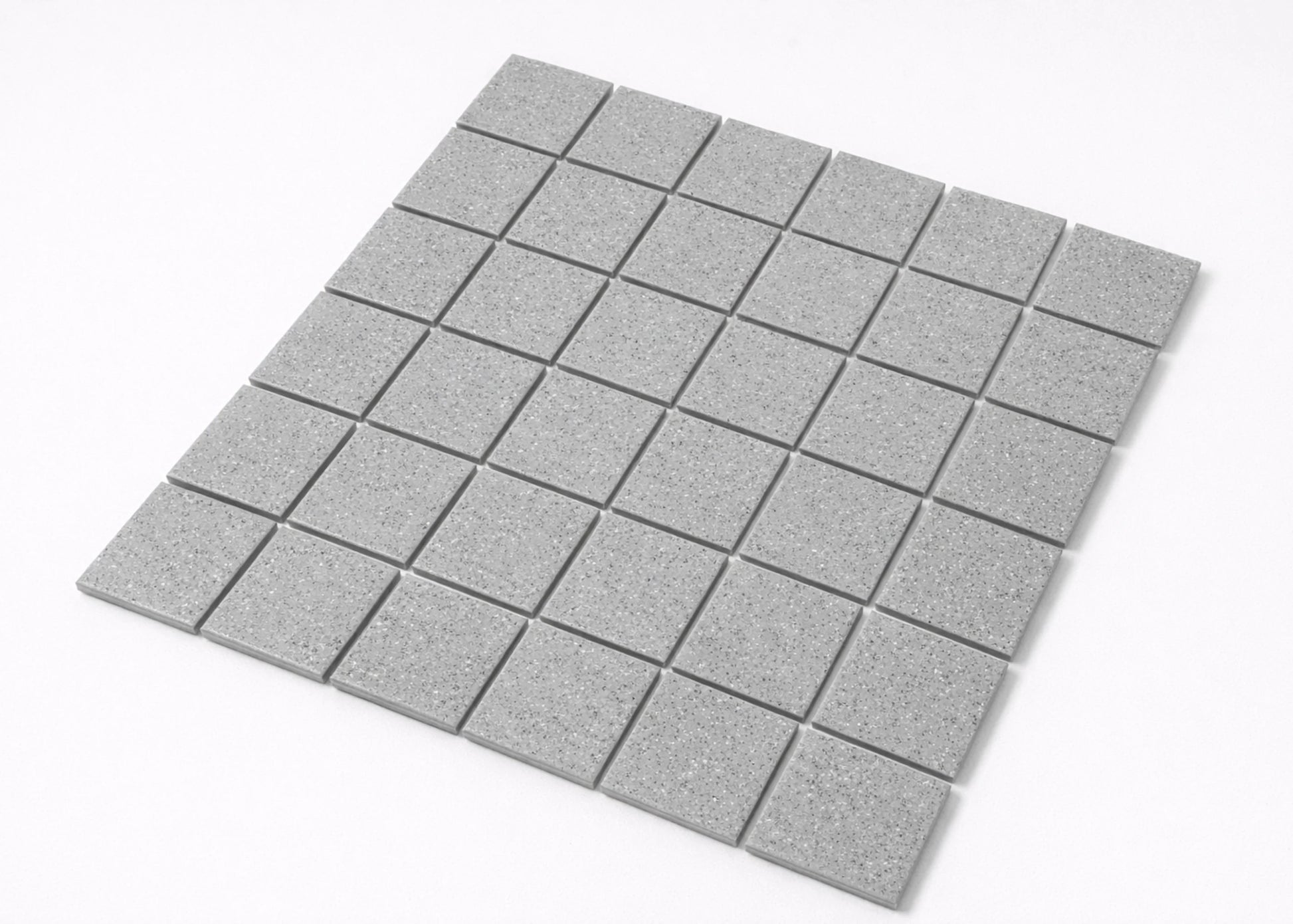 Pack shot of Marlowe Smoke Speckled Matt Mosaic 48x48mm tiles arranged in a square grid, showing grey speckled matt finish and uniform square format.