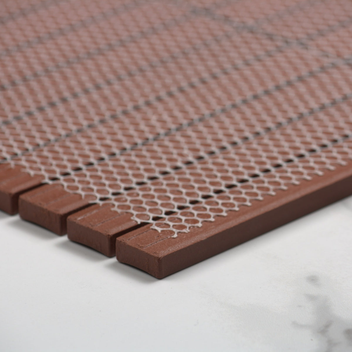 Marlowe Terracotta Concave Speckled Matt Rectangle 20x145mm angle view