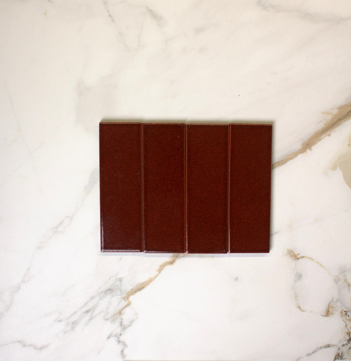 micare saffron dark gloss 50x150mm top view