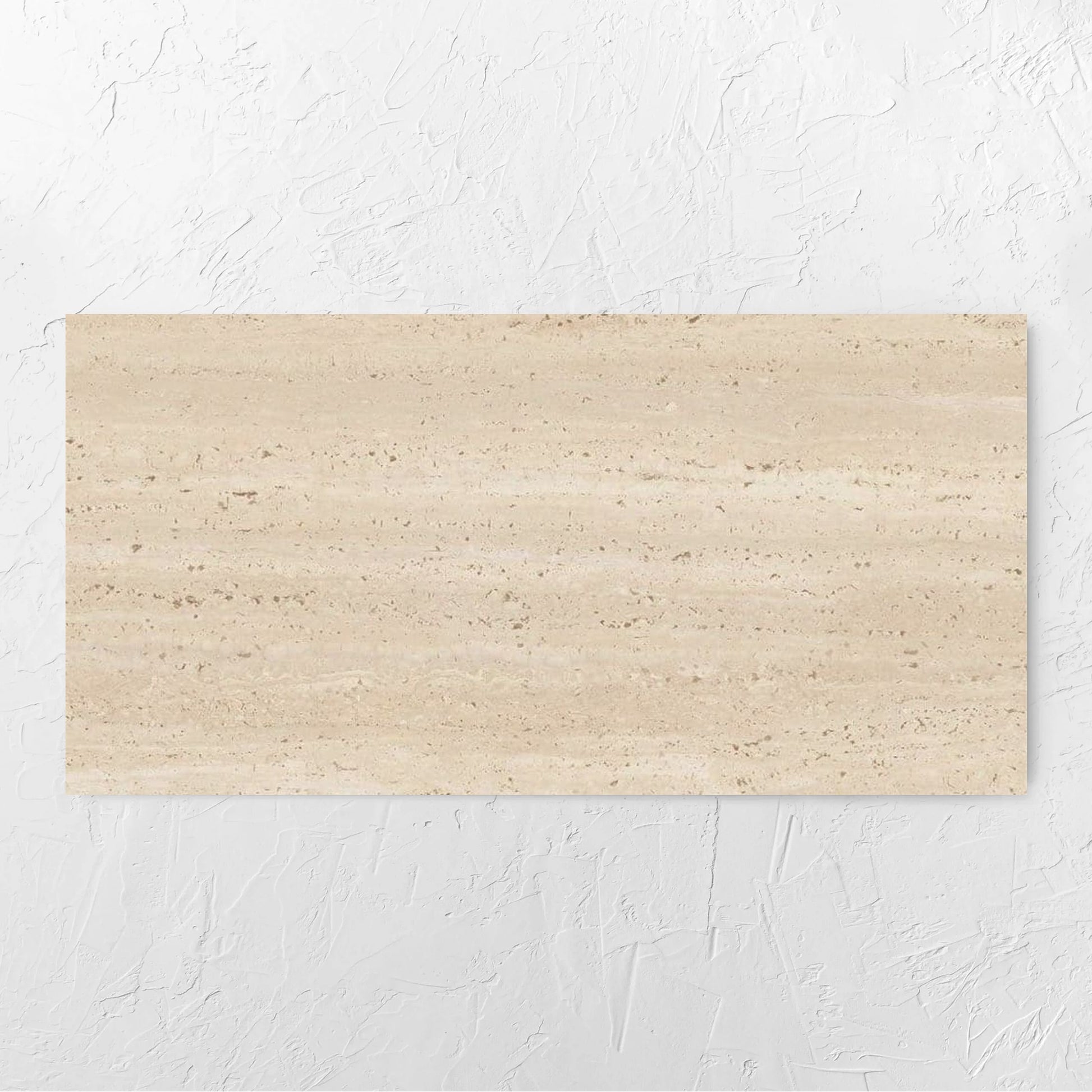 Tallow Vein Cut Travertine Look Beige 600x1200mm tile laid flat on a white rendered wall, showing the tile surface
