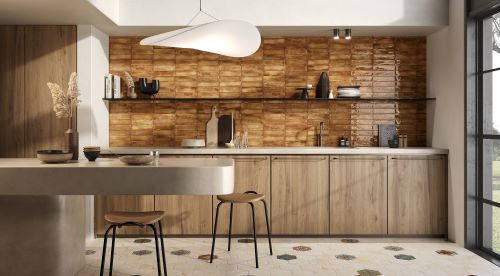 Mojave Cotto Brick 60x250mm tiles used as a warm brown wood-effect kitchen splashback with open shelving, concrete countertops, and a white pendant light.