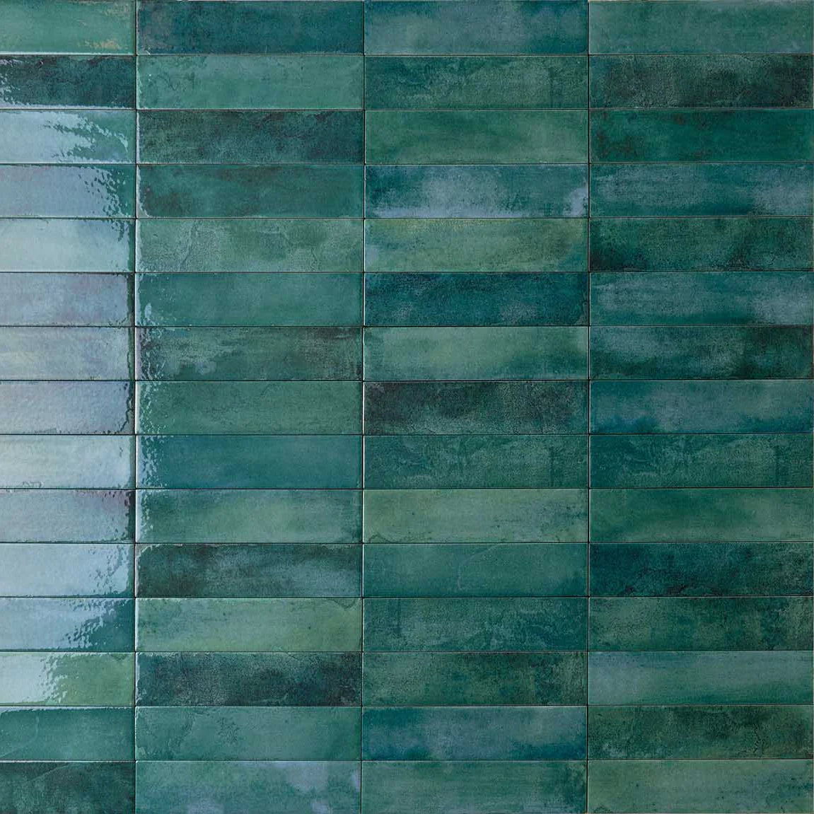 Mojave Sea Water Brick 60x250mm ceramic wall tiles displayed in a stacked horizontal pattern with a glossy teal-green reactive glaze finish.
