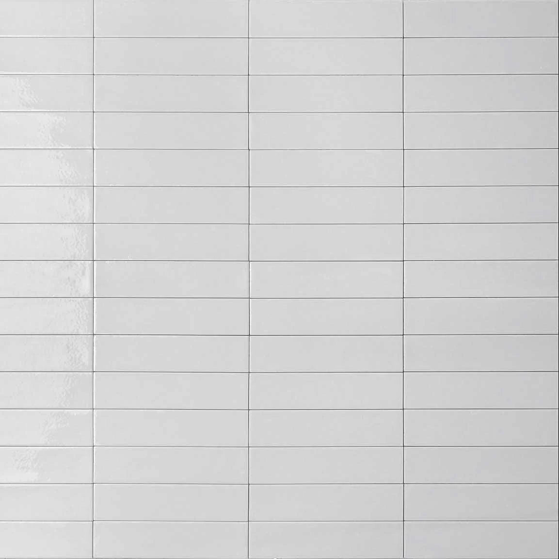 Mojave White Brick 60x250mm tiles shown in a stacked horizontal layout with a glossy white finish and fine grey grout lines.