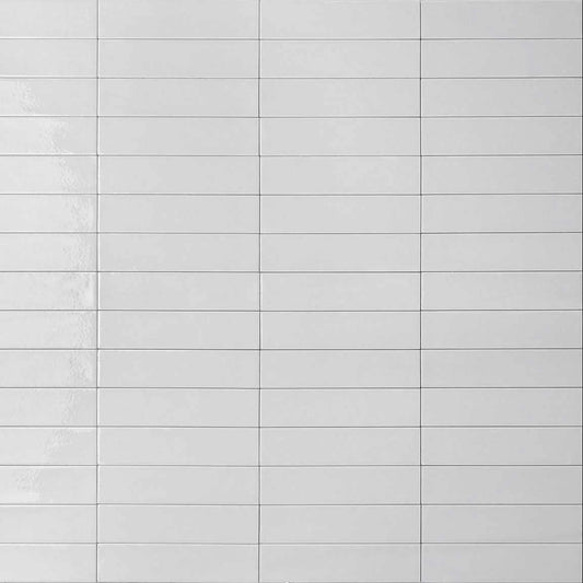 Mojave White Brick 60x250mm tiles shown in a stacked horizontal layout with a glossy white finish and fine grey grout lines.