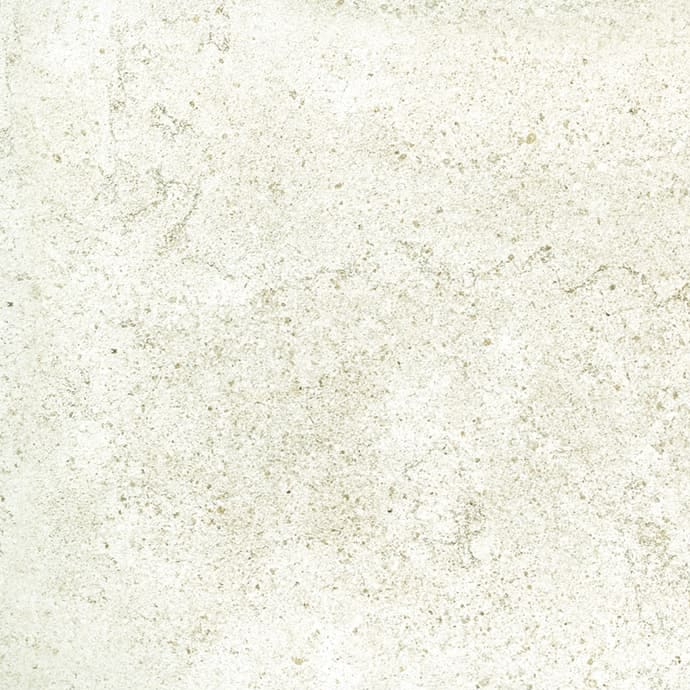Close-up texture shot of Nest White 610x610mm tile showing a matte off-white surface with subtle natural stone-effect veining and speckled detailing.